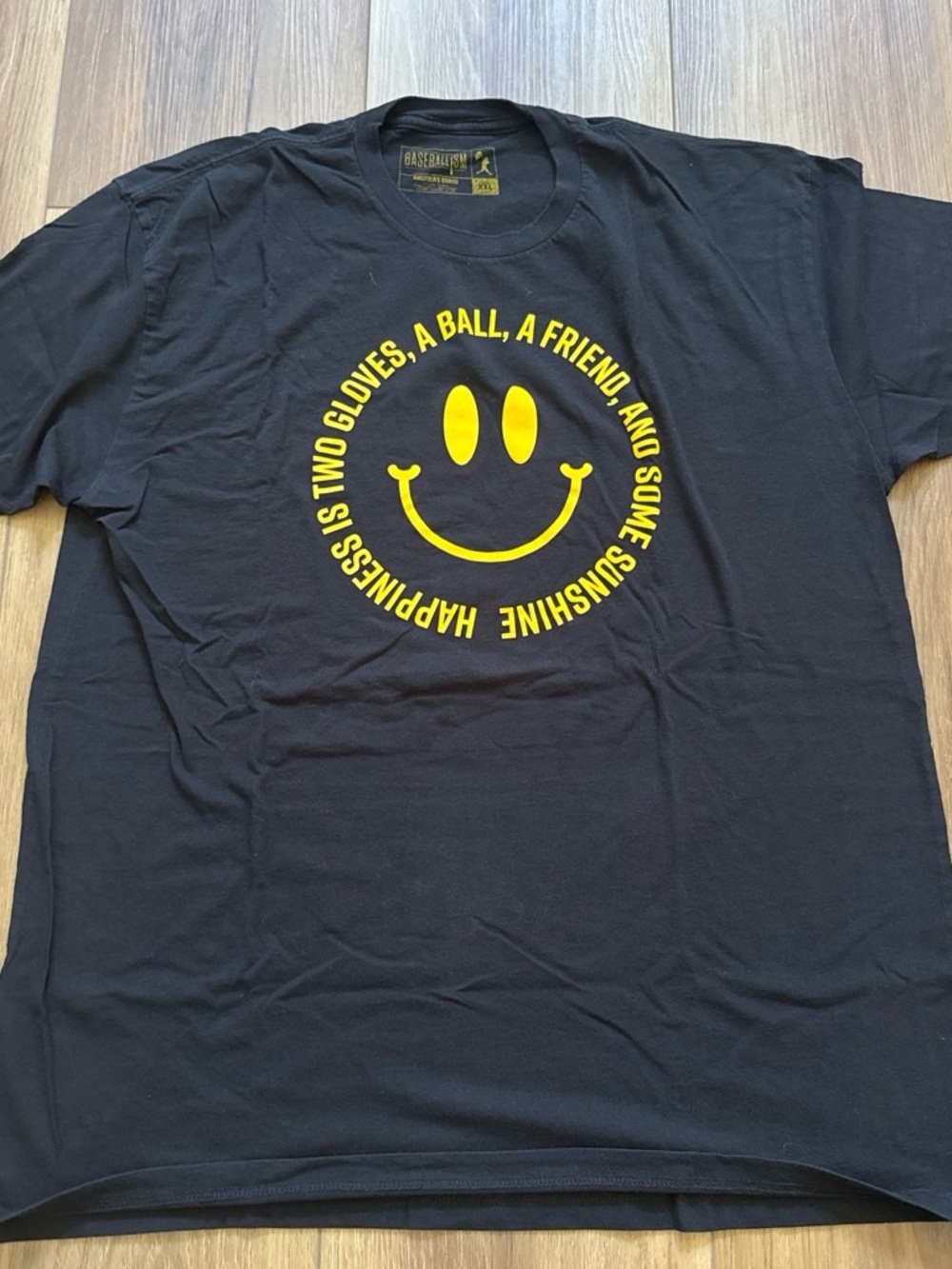 Baseballism Black Short-Sleeve Tee with Yellow Smiley Graphic